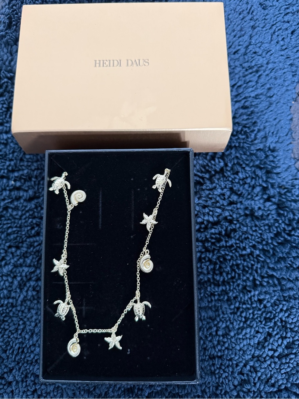 Heidi Daus Silver Sea Life Charm Necklace with Shell and Turtle Accents